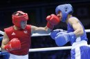 Oubaali of France fights against Afghanistan's Faisal in the men's Fly (52kg) Round of 32 boxing match during the London 2012 Olympic Games