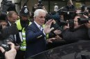 Publicist Max Clifford leaves after appearing at Westminster Magistrates Court in London