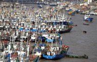 In this photo taken on Thursday, Aug. 4, 2011, fishing boats are seen parked in the Shenjiamen Harbor in Zhoushan in east China's Zhejiang province. China warned residents and alerted emergency relief centers Friday to prepare for Typhoon Muifa to hit the country's heavily populated eastern coast. (AP Photo) CHINA OUT