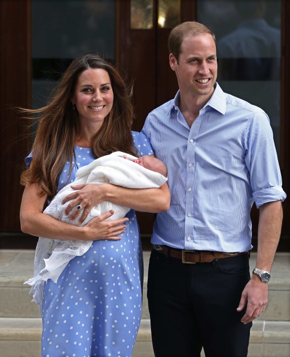 Britain's Prince William and his wife Catherine, Duchess of Cambridge appear with their baby son, outside the Lindo Wing of St Mary's Hospital, in central London