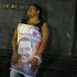 Una partidaria del fallecido mandatario venezolano Hugo Chávez reacciona tras el anuncio de su muerte en Caracas, mar 5 2013
