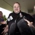 FILE - In this Feb. 22, 2012 file photo, Kim Dotcom, the founder of the file-sharing website Megaupload, comments after he was granted bail and released in Auckland, New Zealand. Indicted Megaupload founder Kim Dotcom has launched a new file-sharing website in a defiant move against the U.S. prosecutors who accuse him of facilitating massive online piracy. The colorful entrepreneur unveiled the "Mega" site ahead of a lavish gala and press conference planned at his New Zealand mansion on Sunday night, Jan. 20, 2013. (AP Photo/New Zealand Herald, Brett Phibbs, File) NEW ZEALAND OUT, AUSTRALIA OUT
