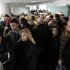 People queue at a tax office during the last working day of the year in northern Athens, Wednesday, Dec. 28, 2011. Tax office employees will hold a 48-hour strike on Thursday and Friday against planned pay cuts and the implementation of a new emergency property tax. (AP Photo/Thanassis Stavrakis)