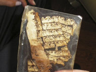 FILE - This undated file photo made available by the Yad Ben Zvi Institute on Nov. 8, 2007, shows a piece of an ancient parchment believed to be part of the most authoritative manuscript of the Hebrew Bible, the Aleppo Codex. Software developed by an Israeli team of scholars led by Moshe Koppel, of Bar Ilan University near Tel Aviv, is giving intriguing new hints about what researchers believe to be the multiple hands that wrote the Bible. (AP Photo/Yad Ben Zvi Institute, File) NO SALES