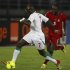Kamissoko of Equatorial Guinea challenges Sow of Senegal during their African Nations Cup Group A soccer match at Estadio de Bata