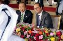 UN Secretary-General Ban Ki-moon speaks with French President Francois Hollande during a lunch at the Royal Palace during the UN Climate Change Conference 2016 in Marrakech