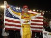 Ryan Hunter-Reay celebrates his victory in the IndyCar auto race at Auto Club Speedway in Fontana, Calif., Saturday, Sept. 15, 2012. (AP Photo/Reed Saxon)