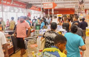 Residents shop at a supermarket as they stock up on &hellip;