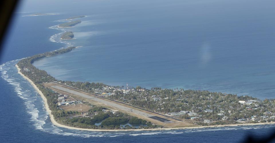 FILE - In this Oct. 13, 2011 photo, Funafuti, the main island of the nation state of Tuvalu, is seen from a Royal New Zealand airforce C130 aircraft...