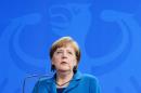 A widening scandal over claims Germany helped the US spy on European targets triggered tensions in Angela Merkel's coalition, which analysts said could potentially prove dangerous for the "untouchable" chancellor