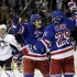 Pittsburgh Penguins' Douglas Murray (3) reacts as New York Rangers' Brian Boyle, center, hugs Ryane Clowe (29) after Clowe scored his second goal of the game during the first period of an NHL hockey game, Wednesday, April 3, 2013, in New York. (AP Photo/Frank Franklin II)