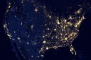 In this image provided by NASA, the United States of America is seen at night from a composite assembled from data acquired by the Suomi NPP satellite in April and October 2012. The image was made possible by the new satellite's 