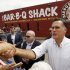 Republican presidential candidate and former Massachusetts Gov. Mitt Romney campaigns at Stepto's BBQ Shack in Evansville, Ind., Saturday, Aug. 4, 2012. (AP Photo/Charles Dharapak)