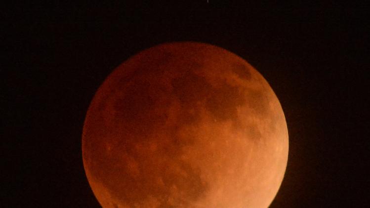 The moon is shown in eclipse from Los Angeles