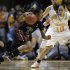 South Carolina's Markeshia Grant (5) drives as she is defended by Tennessee's Meighan Simmons (10) in the first half of an NCAA college basketball game on Thursday, Feb. 2, 2012, in Knoxville, Tenn. (AP Photo/Wade Payne)