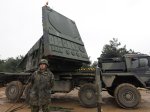 A soldier of the German armed forces Bundeswehr stands next to a radar, which is part of the Patriot system, at a Turkish military base during media day in Kahramanmaras