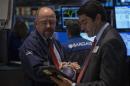 Traders work on the floor of the New York Stock Exchange