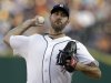 Detroit Tigers pitcher Justin Verlander throws against the Minnesota Twins in the first inning of a baseball game in Detroit, Tuesday, Aug. 16, 2011. (AP Photo/Paul Sancya)