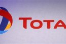 The logo of French oil company Total is seen during the company's 2011 annual result presentation in Paris