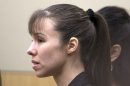 Jodi Arias stands as the jury enters the courtroom before the verdict for sentencing was declared a hung jury for her first degree murder conviction at Maricopa County Superior Court in Phoenix on Thursday, May 23, 2013. The jury in Jodi Arias' trial was dismissed Thursday after failing to reach a unanimous decision on whether the woman they convicted of murdering her one-time boyfriend should be sentenced to life or death in a case that has captured headlines worldwide with its sex, lies, violence. (AP Photo/The Arizona Republic, David Wallace, Pool)