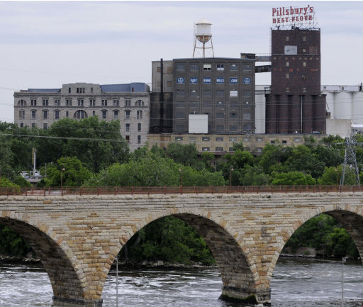 In this photo taken Tuesday, June 14, 2011, the historic Pillsbury A Mill is shown on the east side of the Mississippi River in Minneapolis. The facility , once the world's most advanced flour mill, was named among America's 11 Most Endangered Historic Places. (AP Photo/Jim Mone)