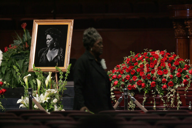 Singer Etta James's picture is seen next to her casket during a funeral, Saturday, Jan. 28, 2012, at Greater Bethany Community Church City of Refuge in Gardena, Calif. James died last Friday at age 73 after battling leukemia and other ailments, including dementia. She was most famous for her classic "At Last," but over her decades-long career, she became revered for her passionate singing voice. (AP Photo/Ringo H.W. Chiu)