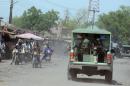 A file photo taken on April 30, 2013 shows joint Military Task Force (JTF) patrolling the streets of the restive northeastern Nigerian town of Maiduguri, Borno State