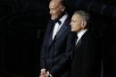 Zadan and Meron, Academy Award Producers, look on at the 86th Academy Awards in Hollywood