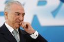 Brazil's President Michel Temer reacts during a ceremony at Planalto Palace in Brasilia