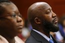 The parents of Trayvon Martin, Tracy Martin, right, and Sybrina Fulton, listen to the testimony of Sanford police officer Chris Serino during the George Zimmerman trial in Seminole Circuit Court, in Sanford, Fla., Monday, July 8, 2013. Zimmerman is charged with second-degree murder in the fatal shooting of Trayvon Martin, an unarmed teen, in 2012. (AP Photo/Orlando Sentinel, Joe Burbank, Pool)