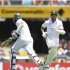South Africa's Petersen and Amla complete a run against Australia during the first cricket test match at the Gabba in Brisbane
