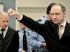 Accused Norwegian Anders Behring Breivik gestures as he arrives at the courtroom, Monday, April 16, 2012 in Oslo, Norway. The terror trial against an anti-Muslim fanatic who confessed to killing 77 people in Norway starts amid worries that he will use the proceedings to showcase his radical views. After opening statements, Anders Behring Breivik is set to testify for five days, explaining why he set off a bomb in downtown Oslo, killing eight, and then shot to death 69 people, mostly teenagers, at a Labor Party youth camp on Utoya island, outside the Norwegian capital.(AP Photo/Hakon Mosvold Larsen, Pool)