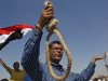 An Egyptian flag flies next an anti-Mubarak protester holding a noose during a rally demanding justice and punishment outside the courtroom during the trial session of ousted president Hosni Mubarak in Cairo, Egypt Saturday, Sept. 24, 2011.  Egypt's military ruler and Hosni Mubarak's former confidant testified Saturday in a rare high-profile appearance at the trial of the ousted president charged with complicity in the killings of protesters during the crackdown on Egypt's uprising. (AP Photo/Nasser Nasser)