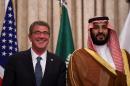 Saudi Defence Minister and Deputy Crown Prince, Mohammed bin Salman (R) and with US Secretary of Defense Ashton Carter (L) pose in Riyadh, on April 20, 2016