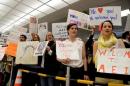 Pro-immigration demonstrators hold protest at Dulles International Airport