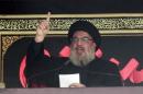 Lebanon's Hezbollah leader Sayyed Hassan Nasrallah addresses his supporters during a public appearance at a religious procession to mark Ashura in Beirut's southern suburbs
