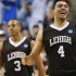 Lehigh's John Adams (4) and C.J. McCollum (3) celebrate after winning an NCAA tournament second-round college basketball game against Duke in Greensboro, N.C., Friday, March 16, 2012. Lehigh won 75-70. (AP Photo/Gerry Broome)