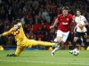 Manchester United's Carrick goes past Galatasaray's Muslera to score during their Champions League soccer match in Manchester