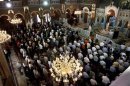 Orthodox faithful attend Sunday mass inside Agia Triada church at Piraeus port town near Athens