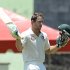 Australian batsman Matthew Wade celebrates after it took him 143 balls to hit a maiden Test century