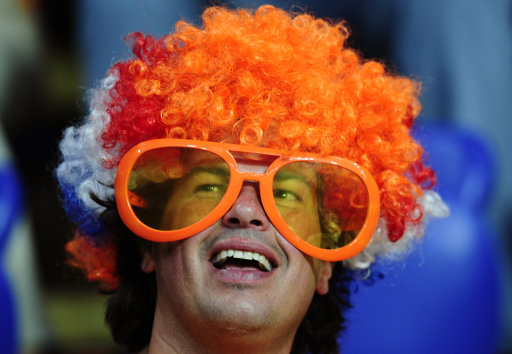 A Netherlands fan cheers prior to the Euro 2012 soccer championship Group B match between the Netherlands and Germany in Kharkiv, Ukraine, Wednesday, June 13, 2012. (AP Photo/Manu Fernandez)