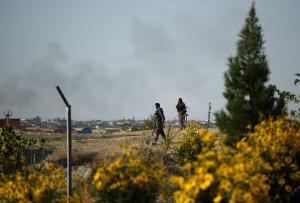 Afghan military personnel walk near the airport during&nbsp;&hellip;