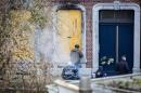Belgian police and forensic investigators work in Colline Street in Verviers, eastern Belgium, on January 16, 2015, one day after two suspected jihadists were killed in a police raid