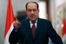 Iraqi Prime Minister Nuri al-Maliki speaks at a press conference in Baghdad on January 13, 2014