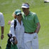 Keegan Bradley walks with his mother Kaye during the par three competition at the Masters golf tournament Wednesday, April 4, 2012, in Augusta, Ga. (AP Photo/Matt Slocum)