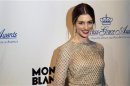 Actress Anne Hathaway poses after presenting an award during the Princess Grace Awards Gala in New York