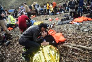 Injured refugees and migrants wait to receive medical &hellip;