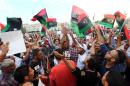 Hundreds of Libyans demonstrate in Tripoli's landmark Martyrs Square on November 9, 2013, to protest against a renewed mandate for the country's top political body, the General National Congress, next year