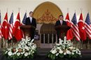 U.S. Secretary of State Kerry and Turkey's Foreign Minister Davutoglu attend a joint news conference in Ankara