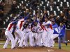 The Dominican Republic team celebrates after defeating the Netherlands during their semi-final World Baseball Classic game in San Francisco
